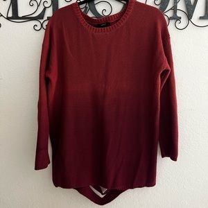 Cute long ombré sweater with an open back.